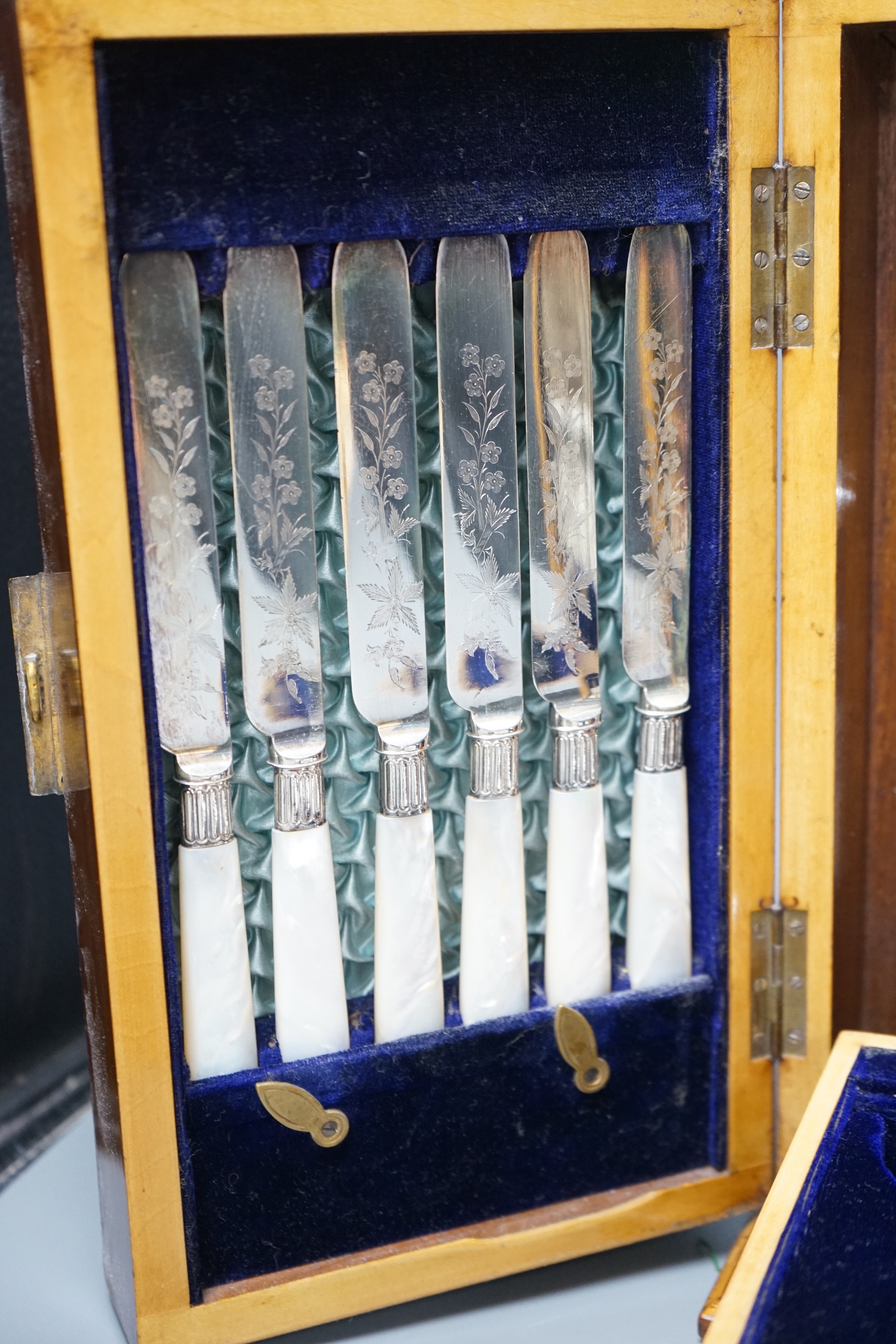 A Victorian plated fruit and nut set in an Irish marquetry inlaid walnut case manufactured by E.R.Moore, Dublin